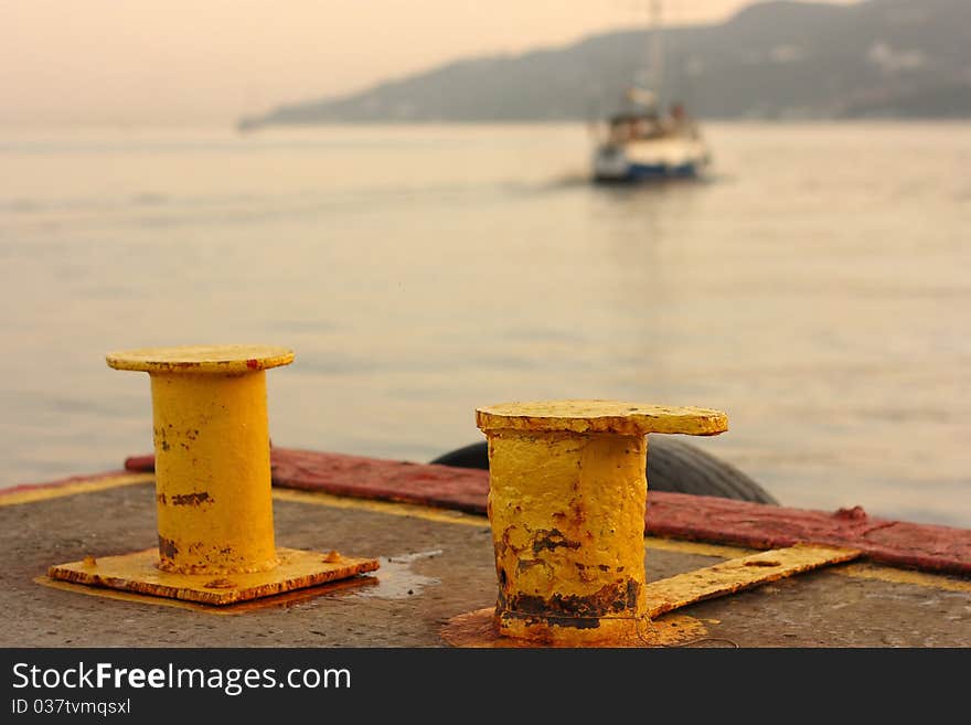 Yellow piles on the berth