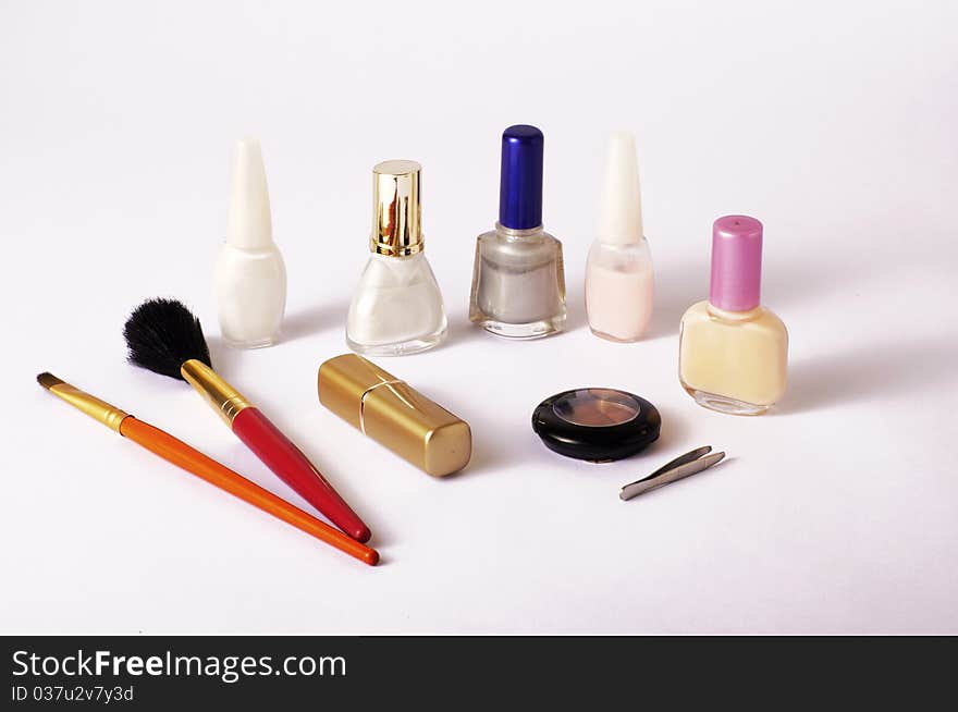 Various makeup items on a table. Various makeup items on a table