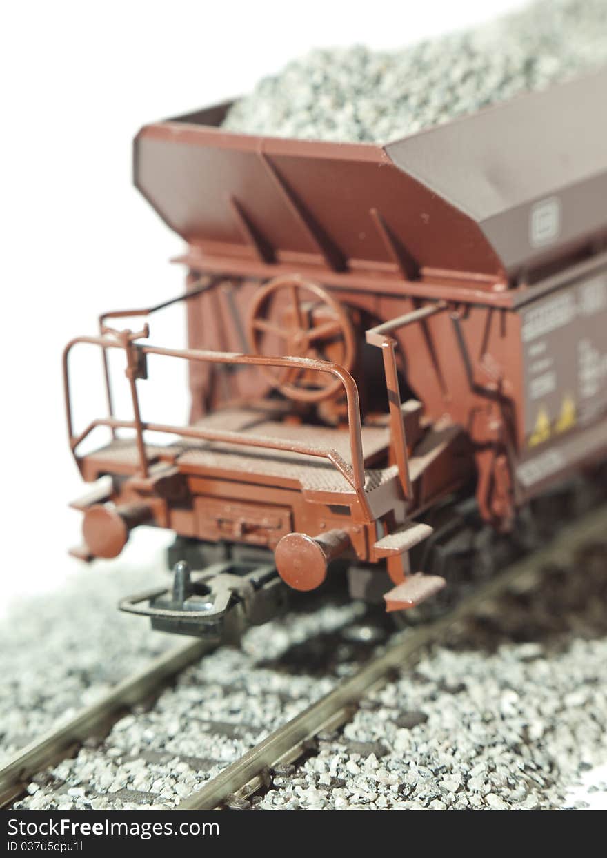 A platform wagon on rail isolated by white background