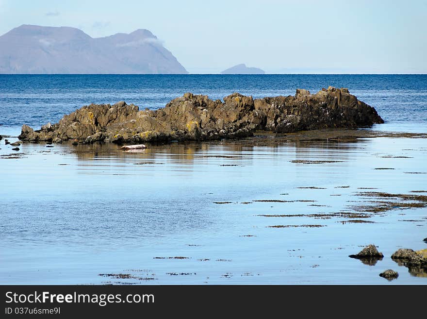 Reflections on the sea of cliffs of the Vatnsnes peninsula in Iceland. Reflections on the sea of cliffs of the Vatnsnes peninsula in Iceland