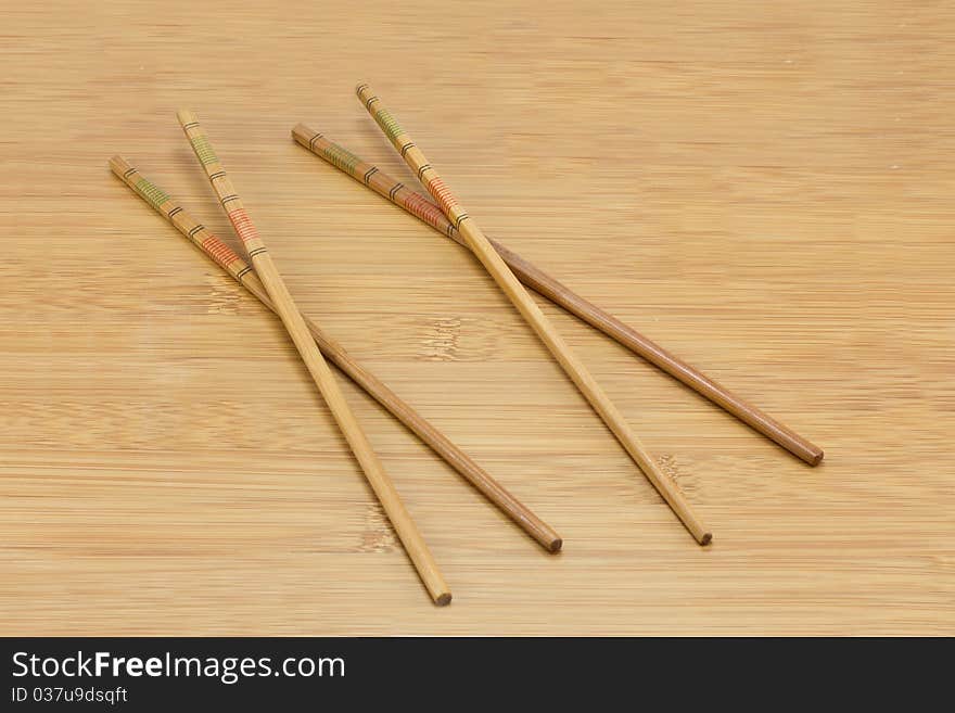 Two pairs of wooden chopsticks