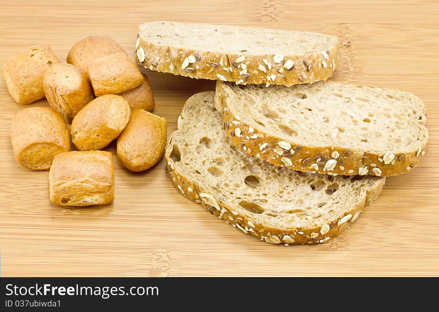 Sliced bread on wooden background