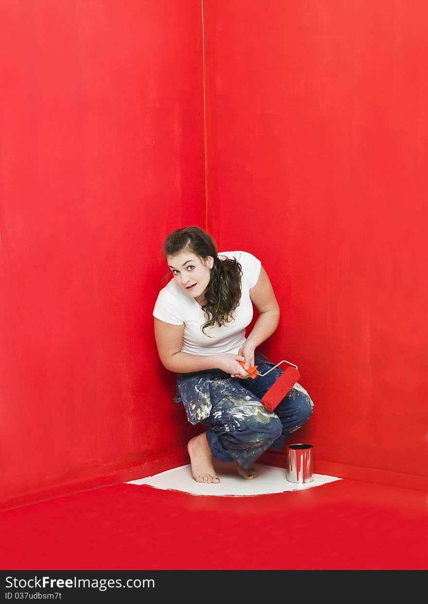 Girl has painted herself in the corner. Girl has painted herself in the corner