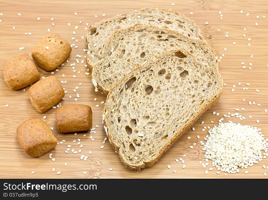 Sliced bread on wooden background