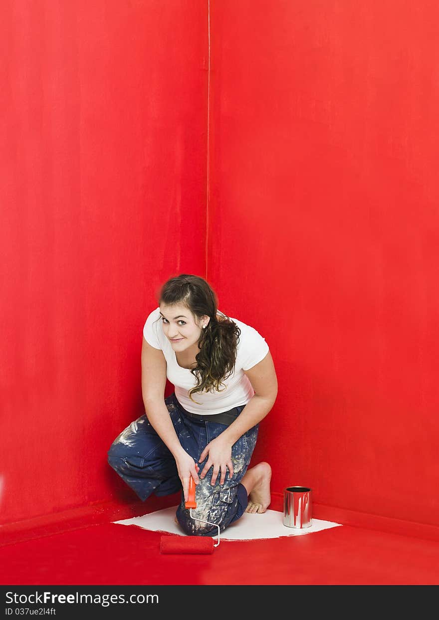 Girl has painted herself in the corner. Girl has painted herself in the corner