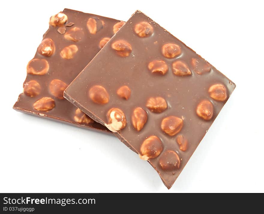 Chocolate with nuts on white background