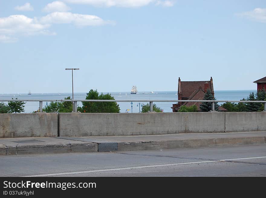 Seascape with a sailing vessel on the horizon. Seascape with a sailing vessel on the horizon