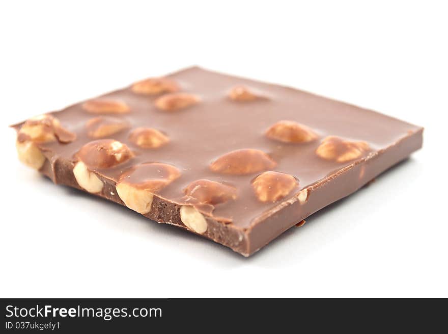 Chocolate with nuts on white background