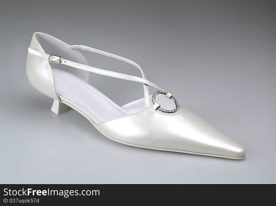 White woman shoe for ceremony and wedding. White woman shoe for ceremony and wedding