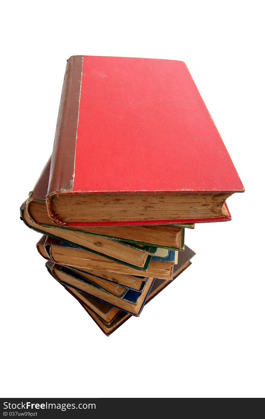 Old books piled together over white background