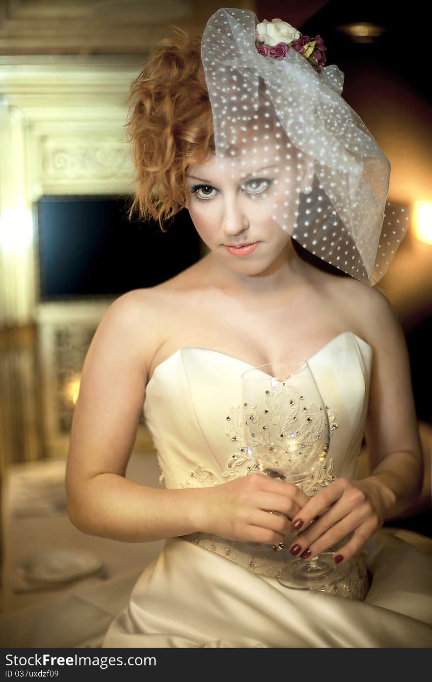 A Girl In White  Clothes Holds Glass