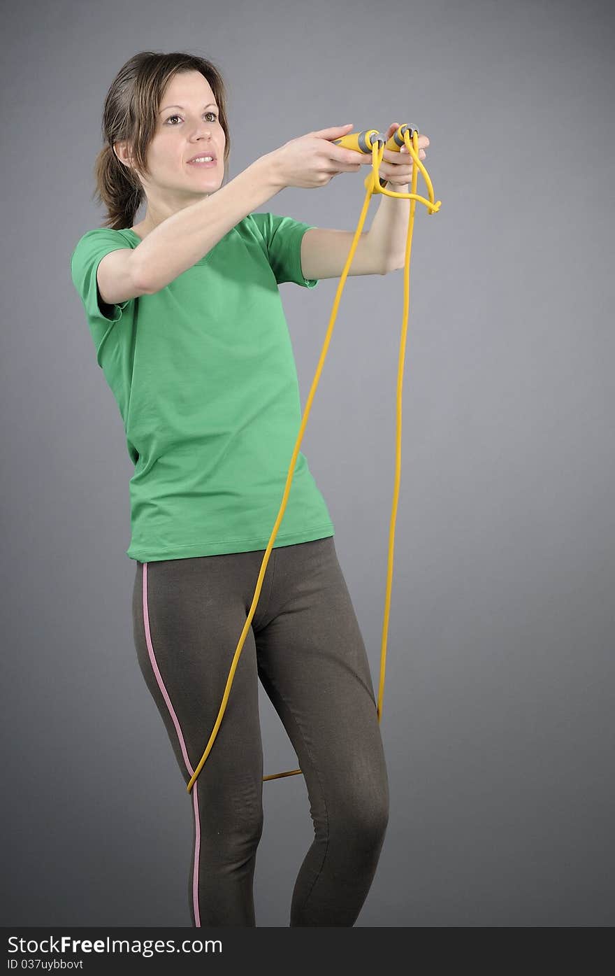 White person exercising with jumping rope. White person exercising with jumping rope