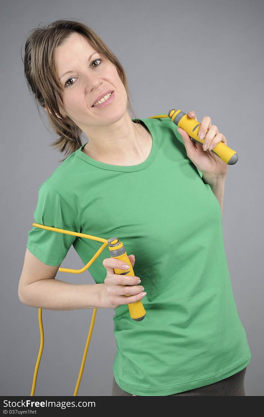 Healthy woman posing with jumping rope. Healthy woman posing with jumping rope