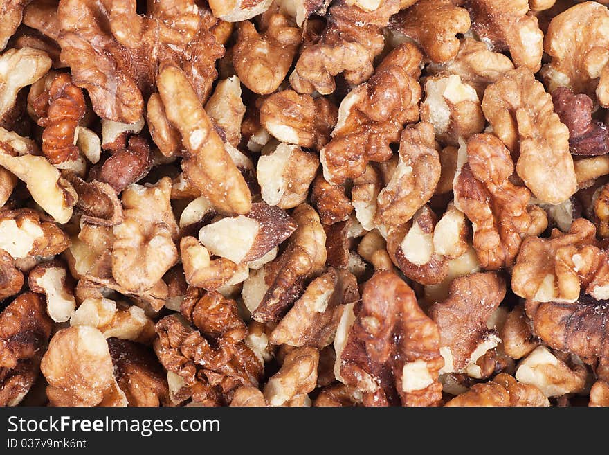 Closeup view of peeled walnuts. Nature background. Closeup view of peeled walnuts. Nature background.