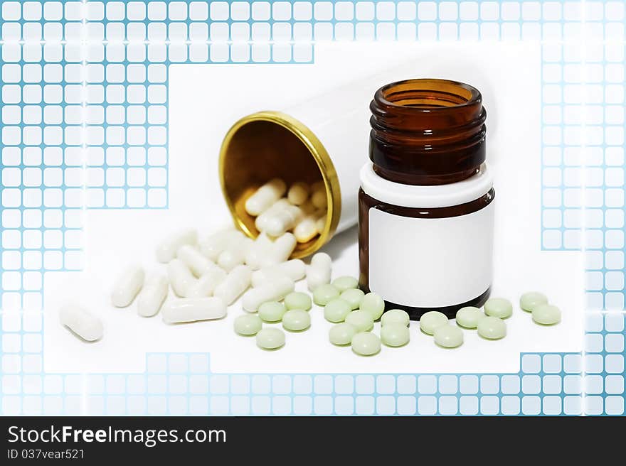 Tablet and capsule drugs, metallic and glass bottle with empty label placed under a blue grid layer. Tablet and capsule drugs, metallic and glass bottle with empty label placed under a blue grid layer