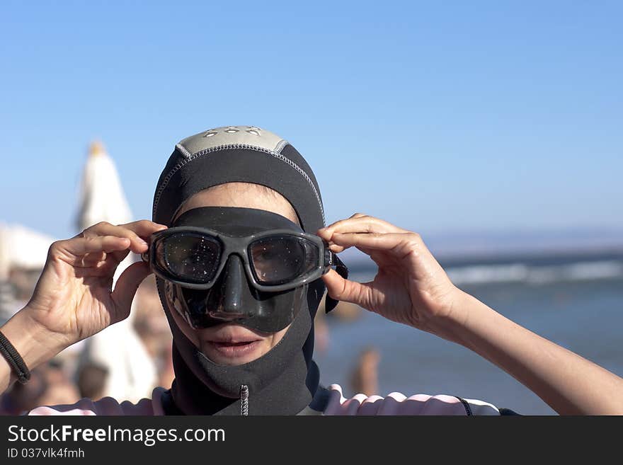 Portrait girl-diver in mask and swimsuit, from seria diver girl. Portrait girl-diver in mask and swimsuit, from seria diver girl