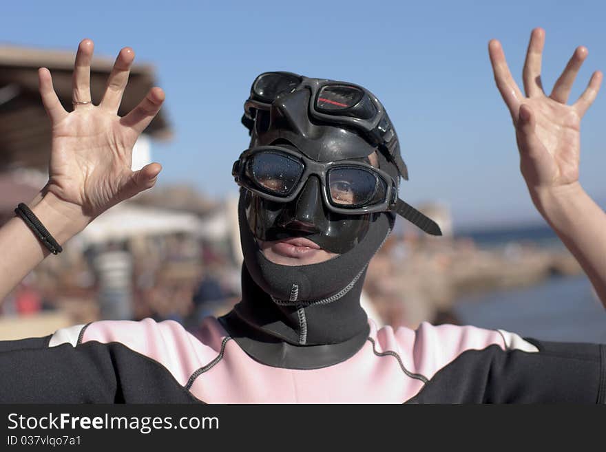 Portrait girl-diver in mask and swimsuit, doing boo!. from seria diver girl. Portrait girl-diver in mask and swimsuit, doing boo!. from seria diver girl