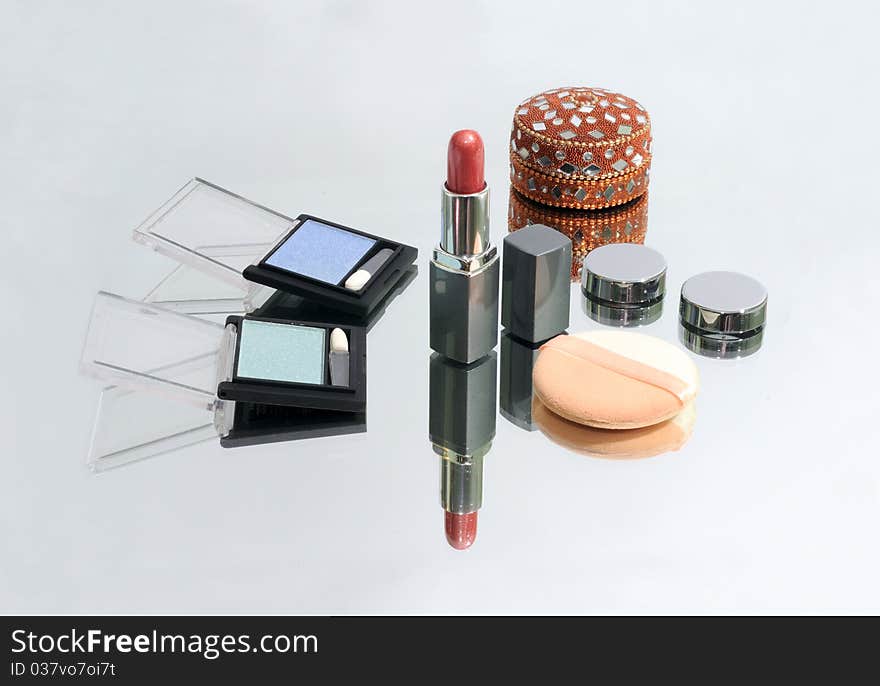 Collection of make-up products and jewel-box