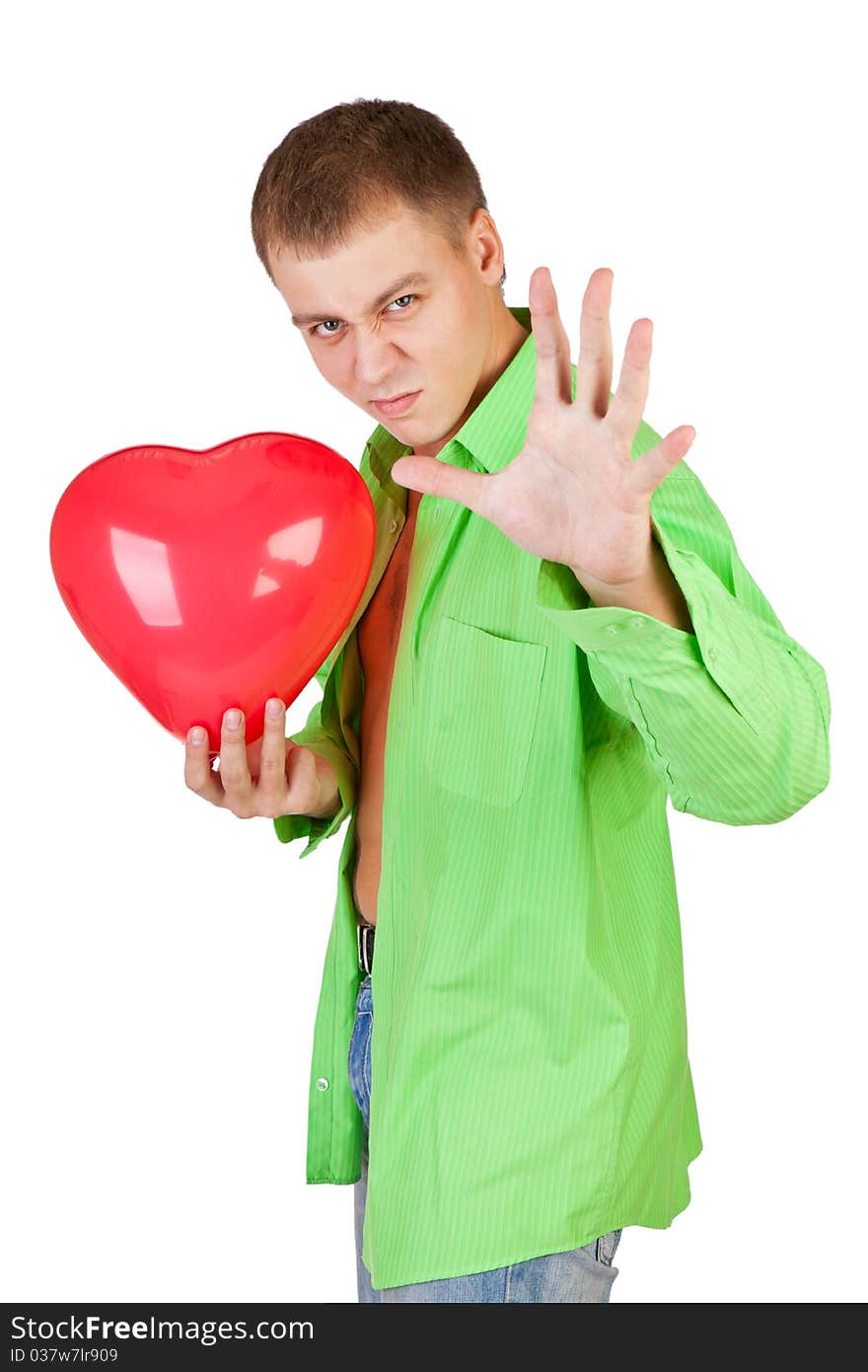 Young guy holding a red heart-shaped balloon on a white background