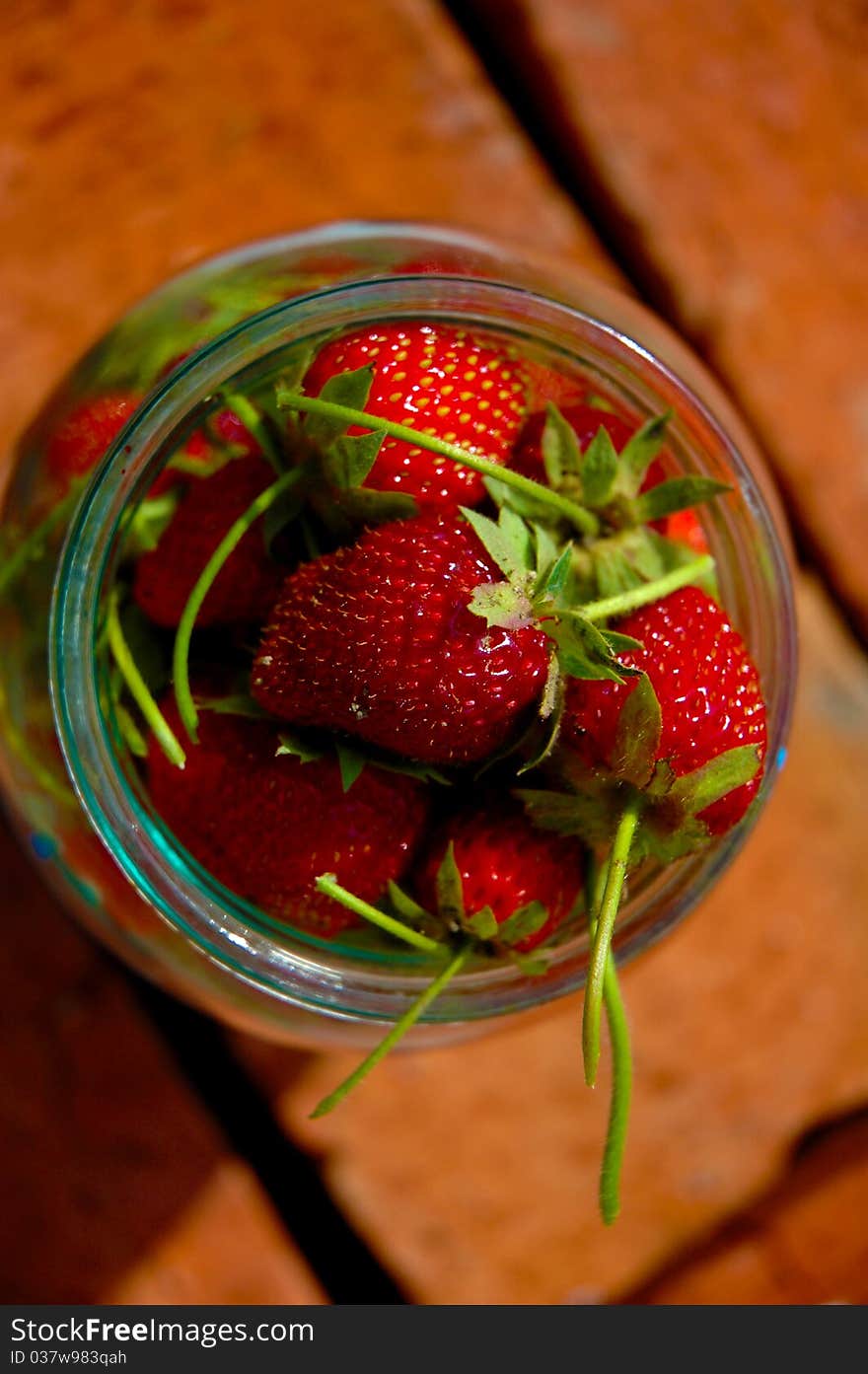 Strawberry in bank with water