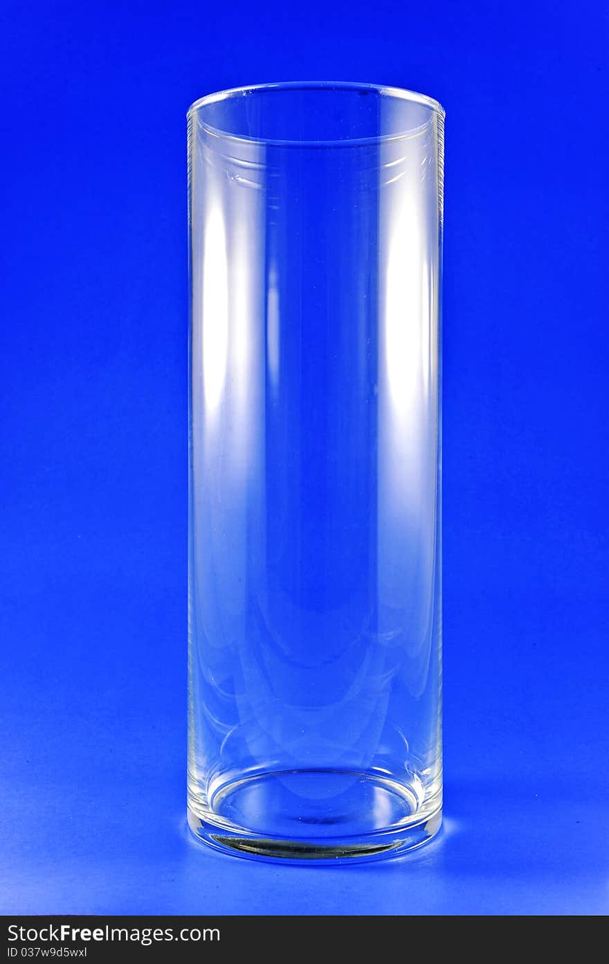 Tall glass on blue for background