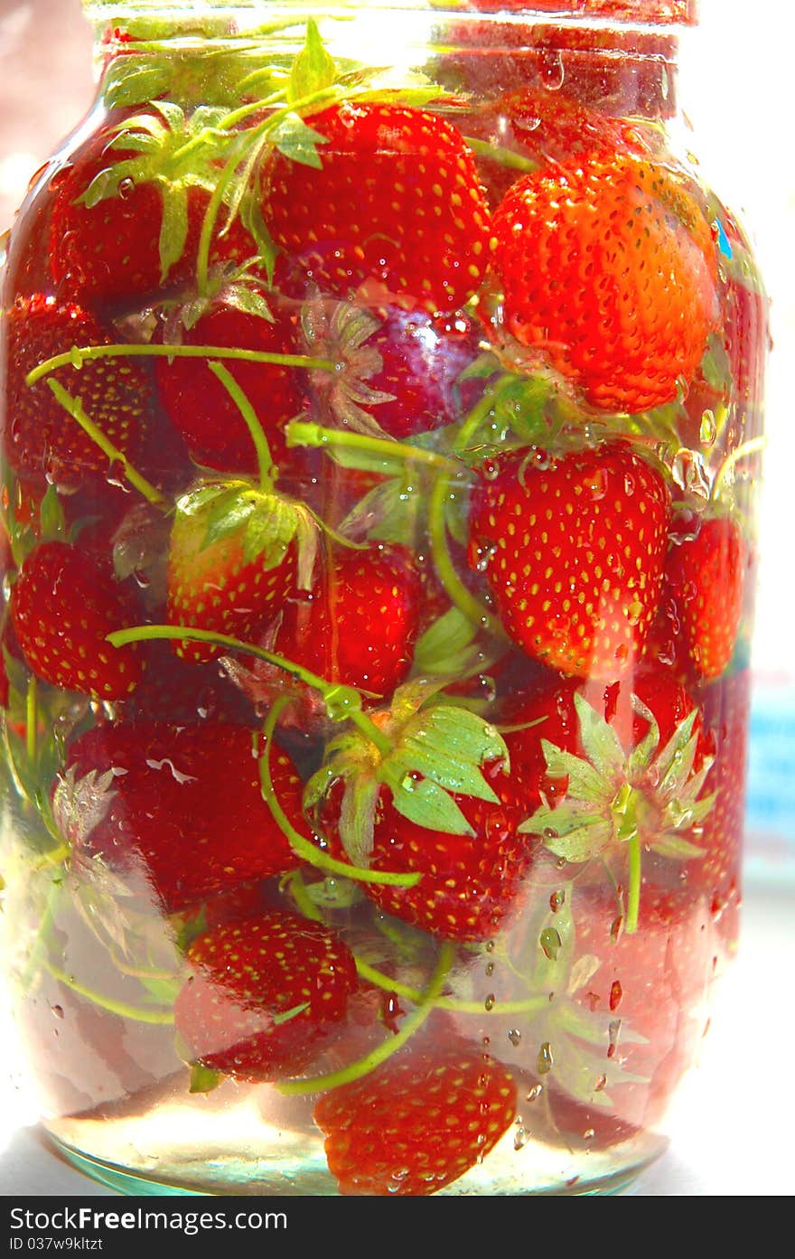 Strawberry in bank with water