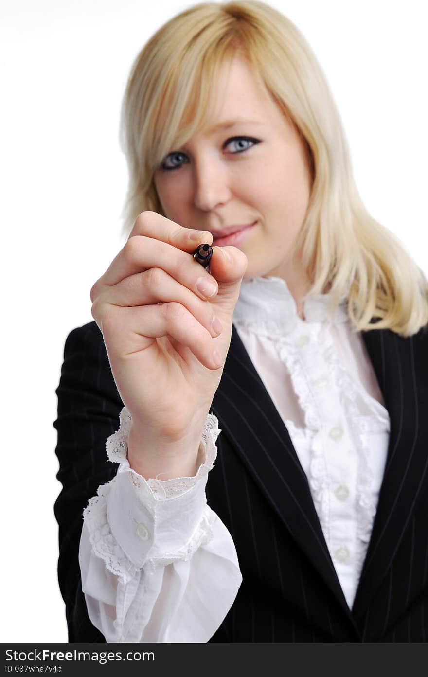 Young business woman drawing on transparent glass. Young business woman drawing on transparent glass