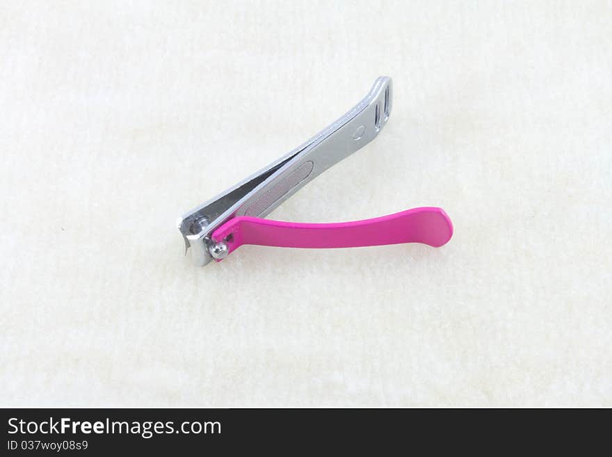 Pink nail scissors.