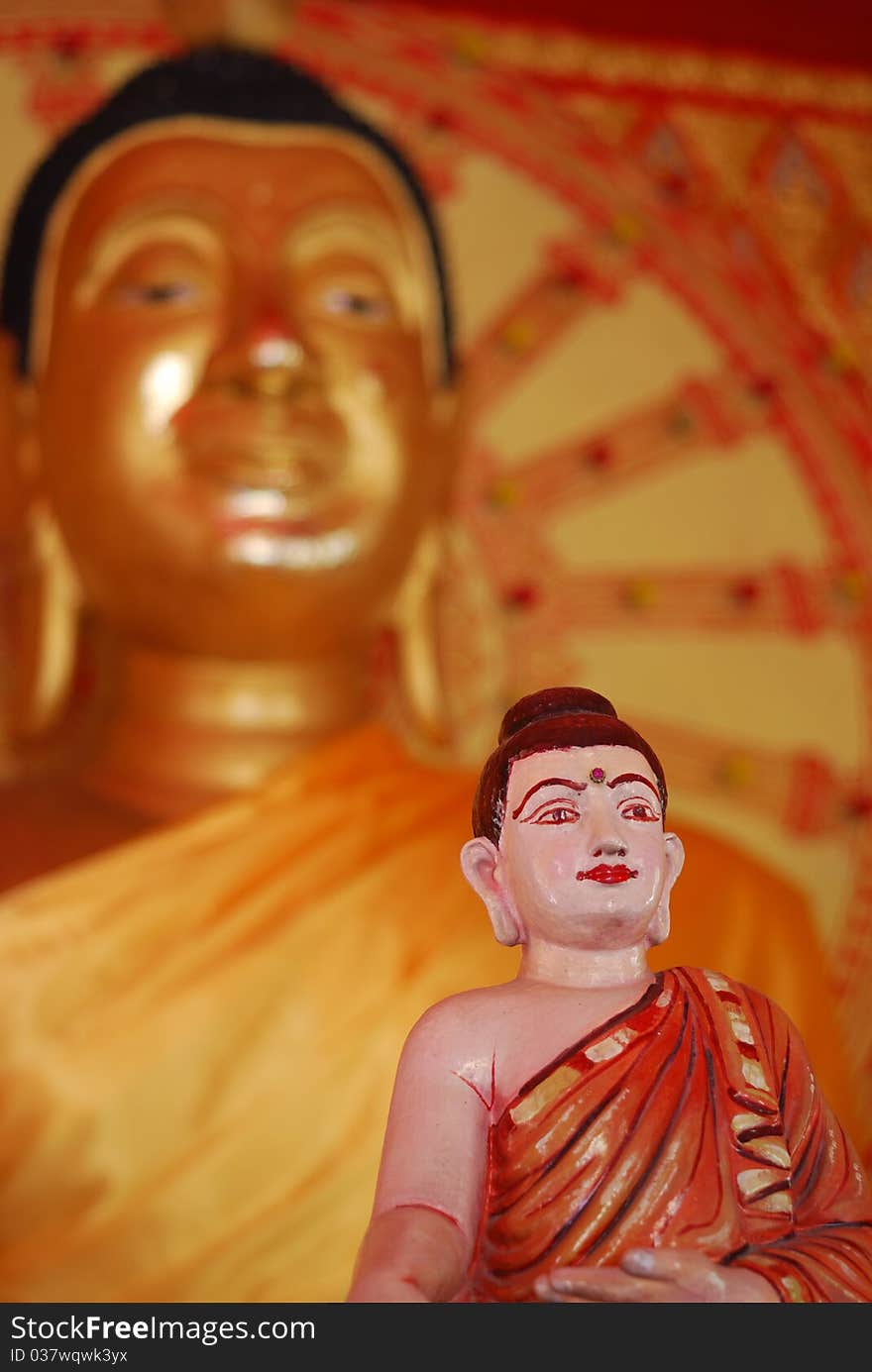 Front view of golden buddha statue