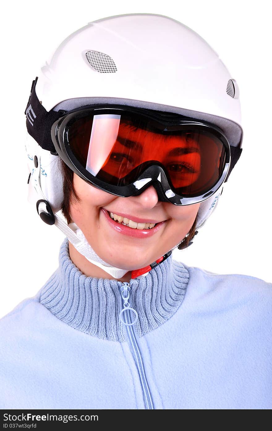 Pretty young woman with ski helmet