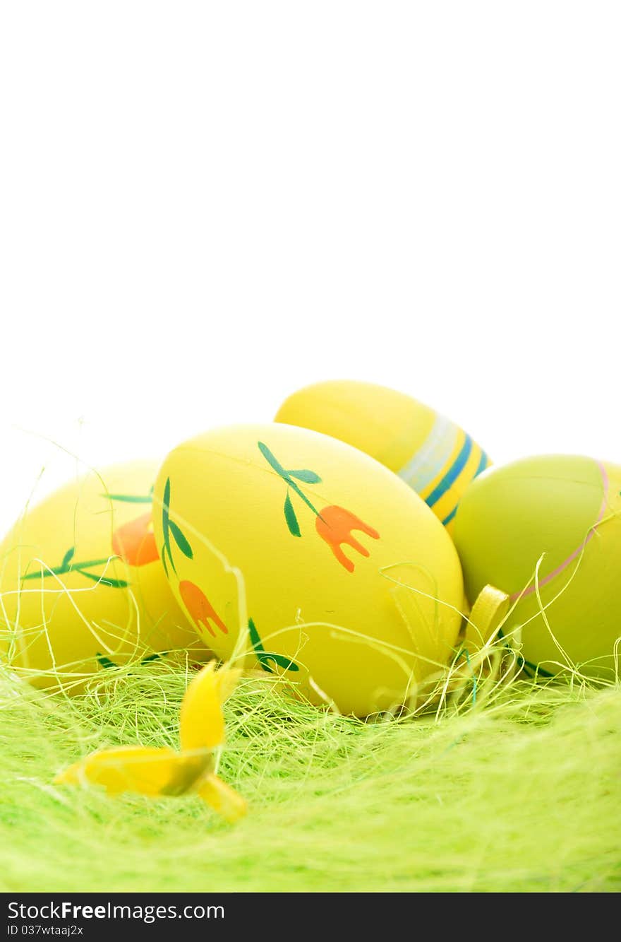 Painted Colorful Easter Eggs on green Grass