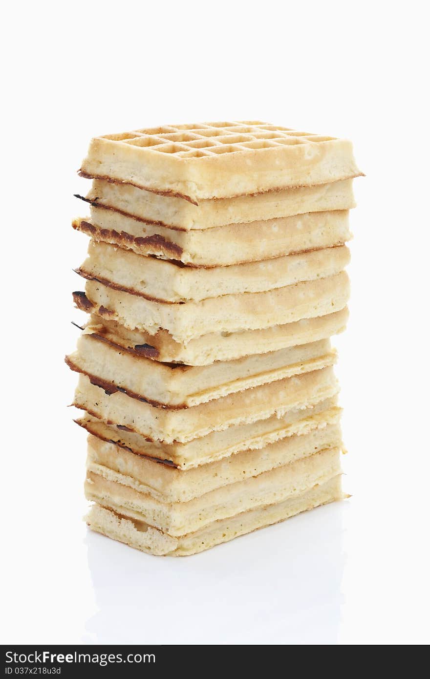 Tower of belgian waffles on white background