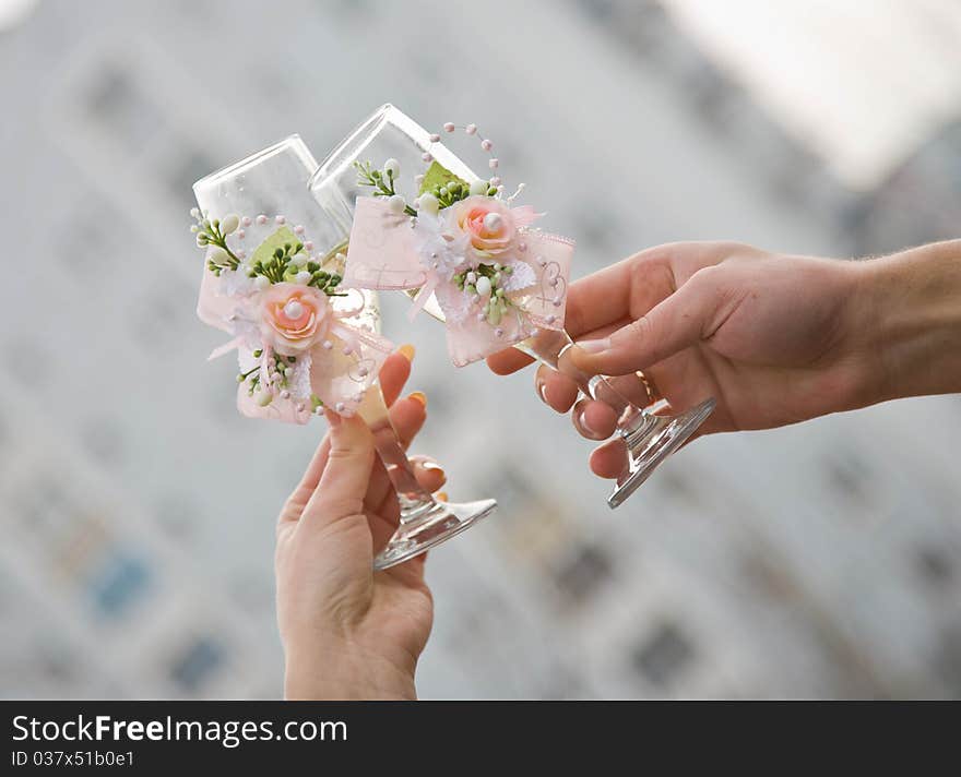 Champagne glasses with rings and flowers. Champagne glasses with rings and flowers