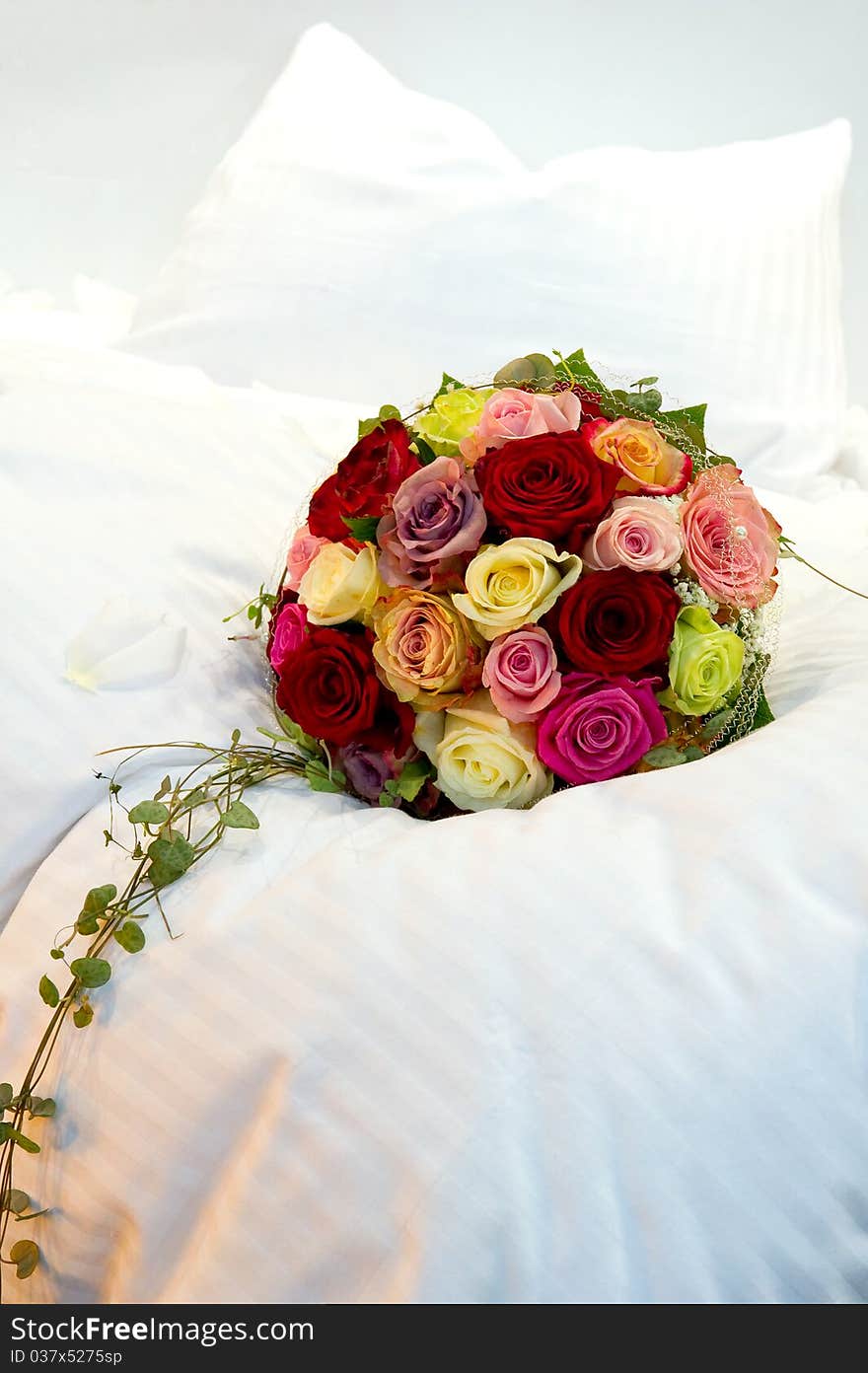 A Bridal Bouquet on a bed