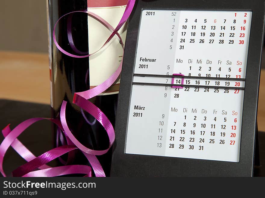 A calendar and a gift for Valentine's Day. A calendar and a gift for Valentine's Day