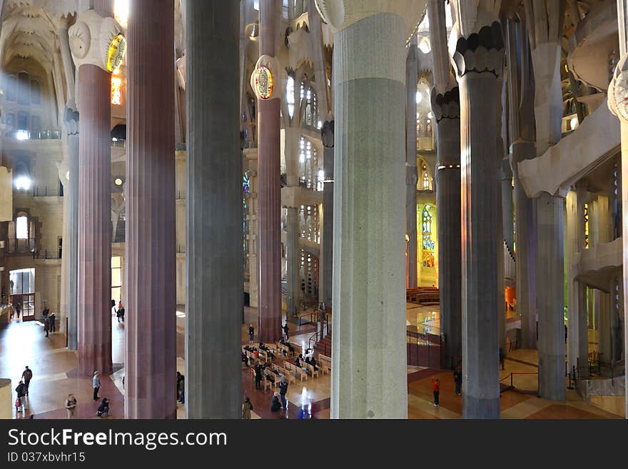 Architecture detail of windows, ceiling and pillars in La Sagrada Familia, Barcelona by Gaudi