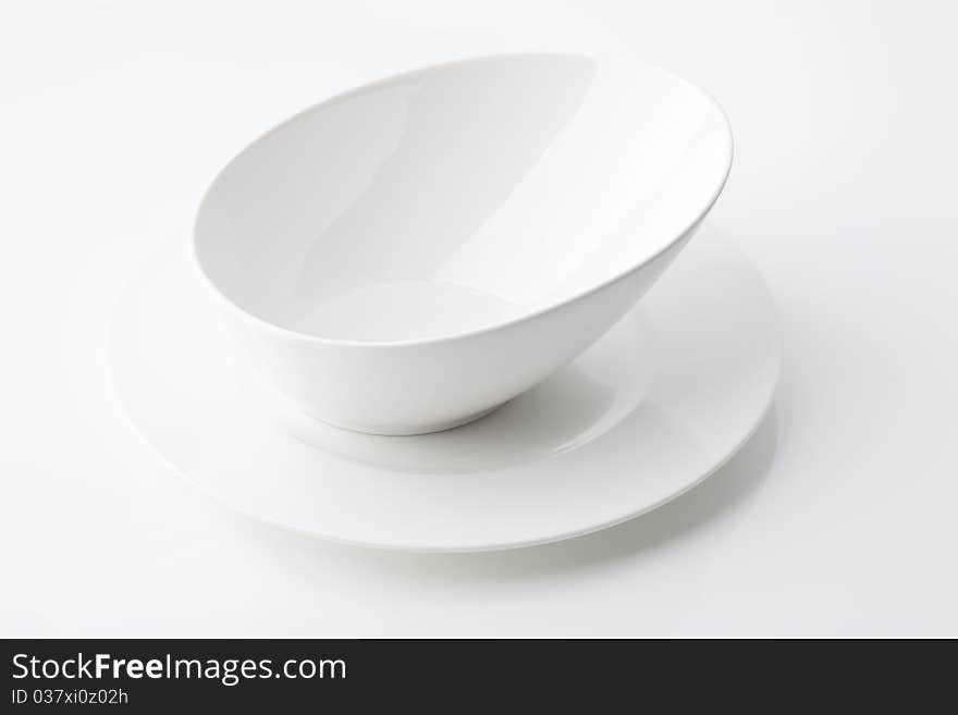 Empty white soup bowl on white background. Empty white soup bowl on white background