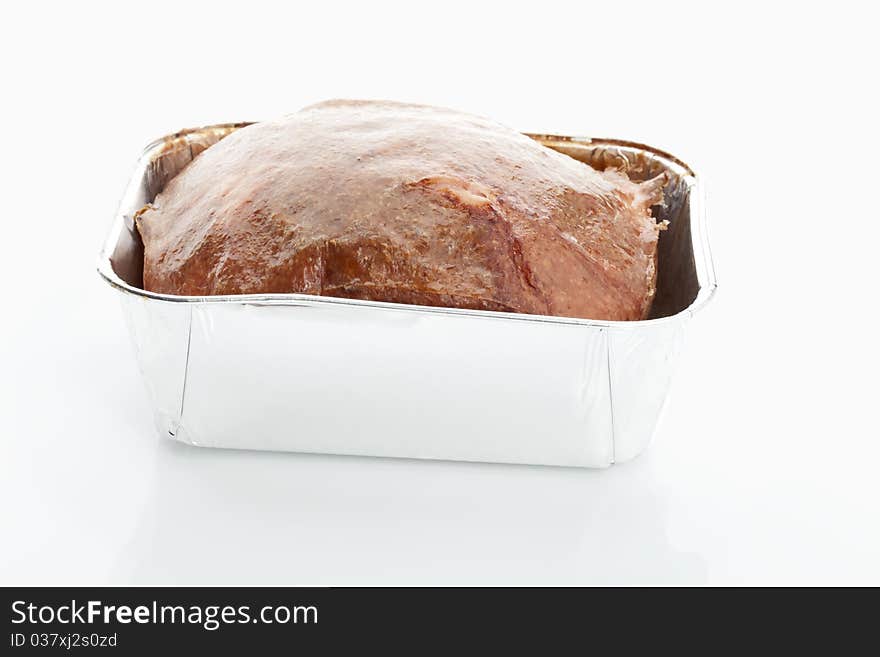 Baked meatloaf on white background