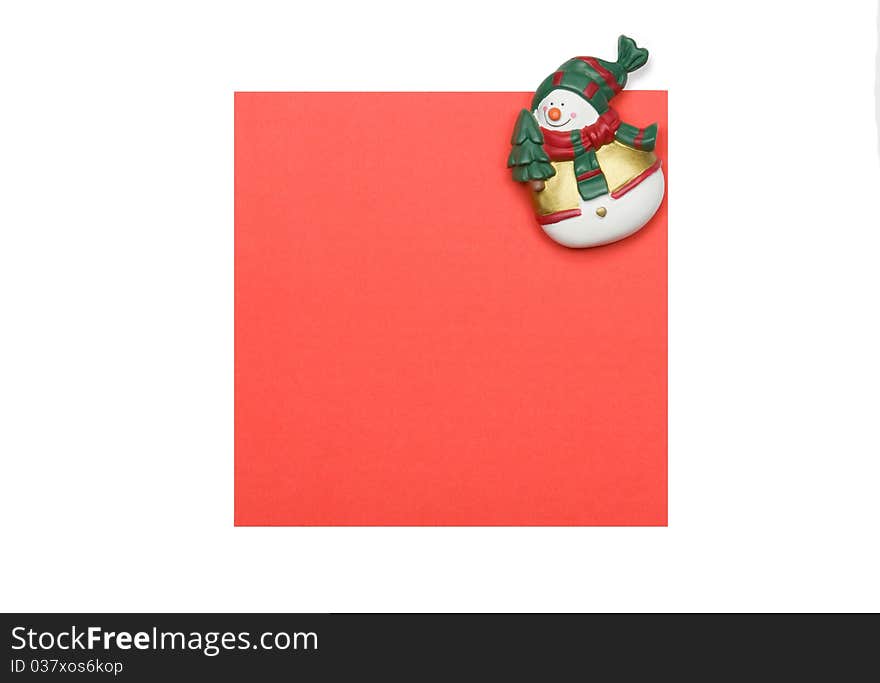 Snowman Refrigerator Magnet On A Paper Sheet