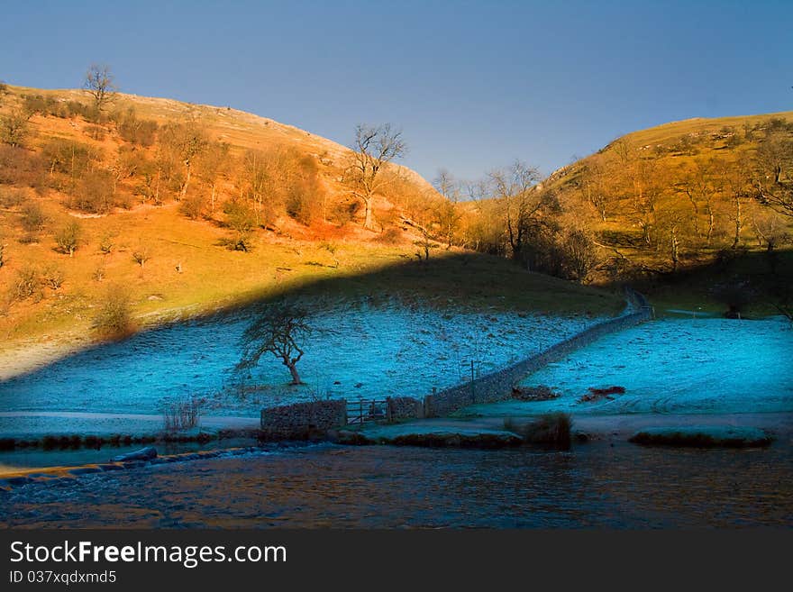 Sun shining on the hills on a frosty morning. Sun shining on the hills on a frosty morning