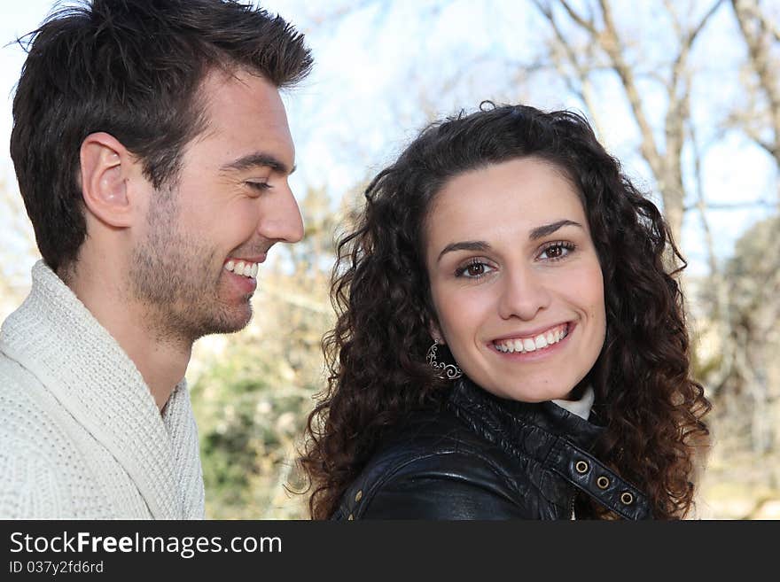 Smiling couple outdoors