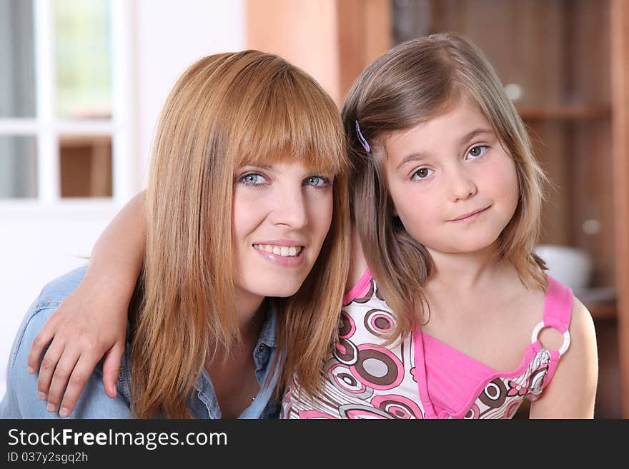 Portrait of a woman and a girl. Portrait of a woman and a girl