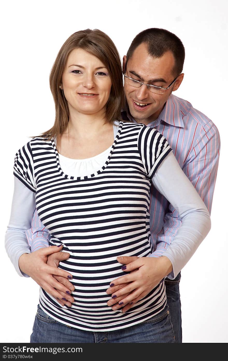 Happy young man and his pregnant wife