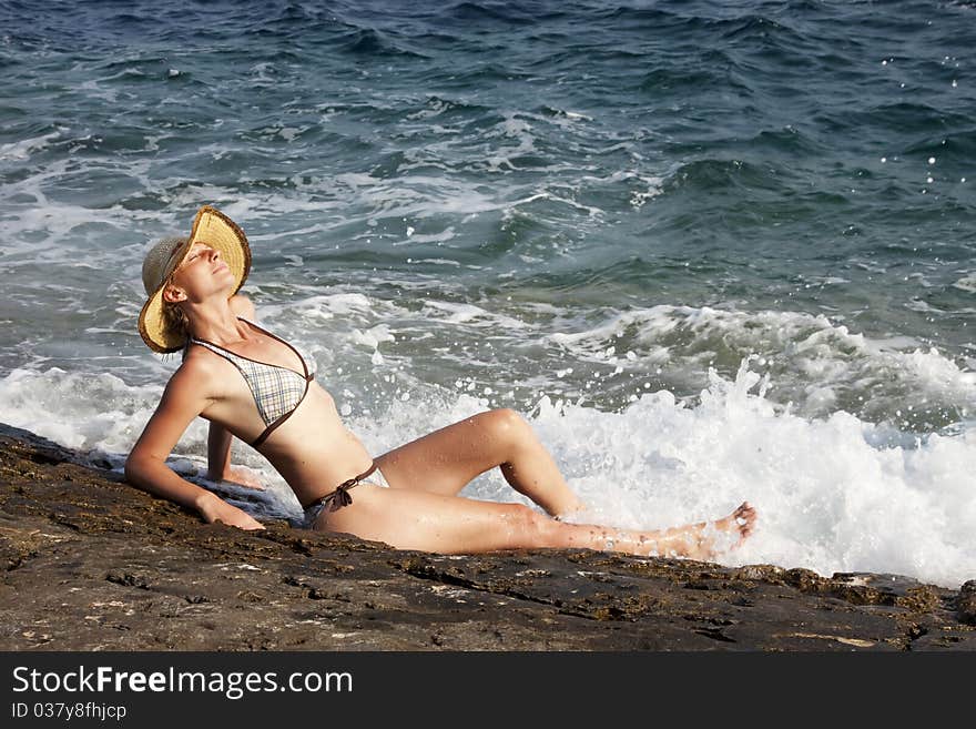 Woman With Hat Sunbathing