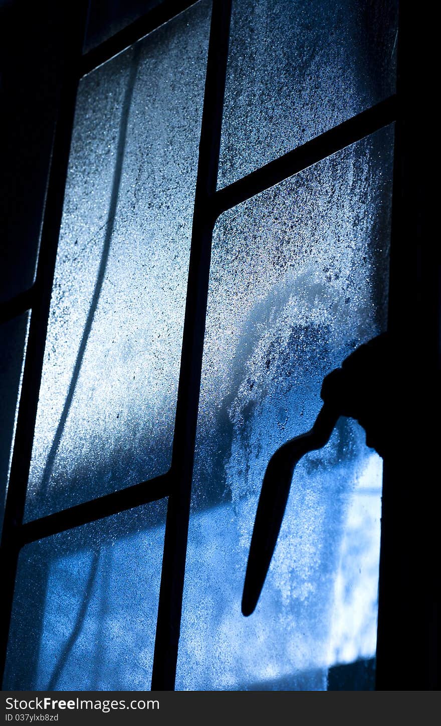 Water drops on the window as they formed during a cold winter night. Water drops on the window as they formed during a cold winter night