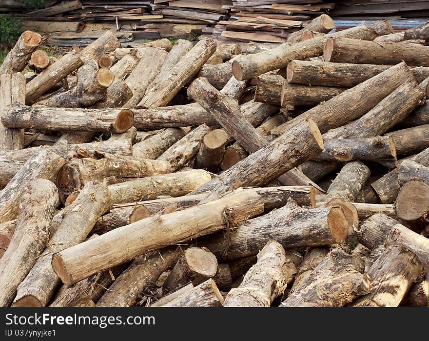 Pile of wood logs befor build.