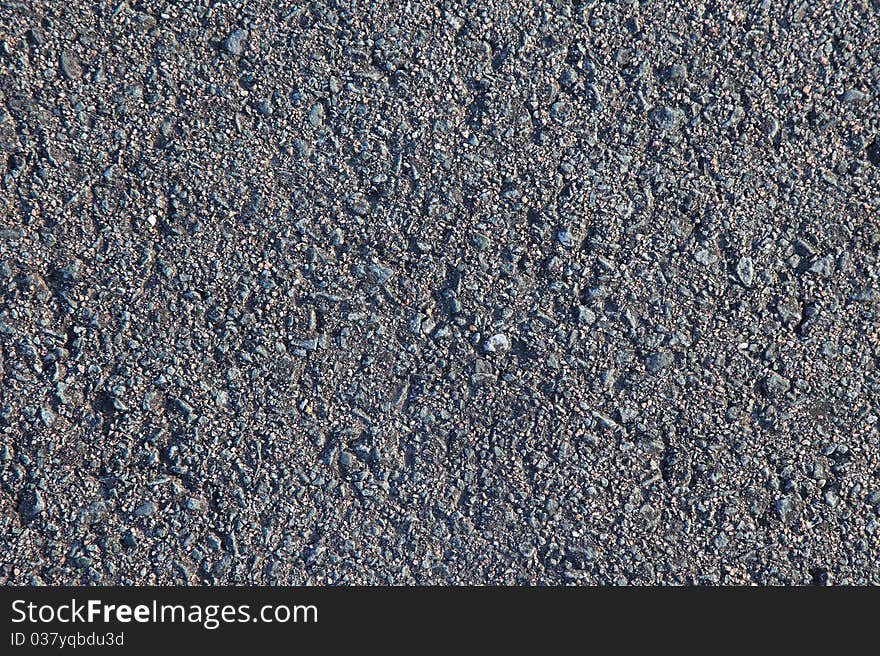 Gray asphalt as textured background.