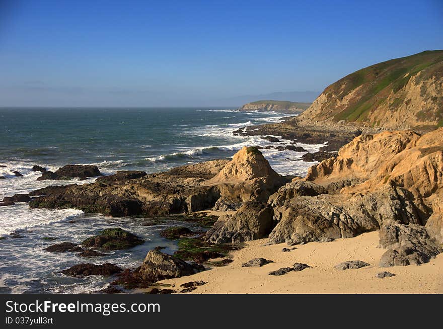 Scenic shot of the Pacific ocean at low tide from Bodega Head, California on a clear, sunny day. Scenic shot of the Pacific ocean at low tide from Bodega Head, California on a clear, sunny day.