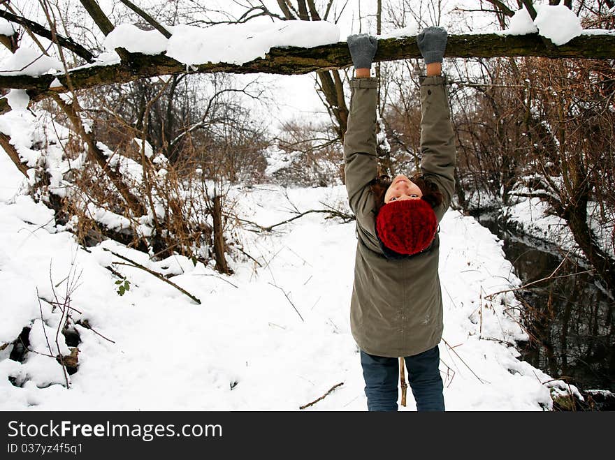 Teenage girl in snowy park