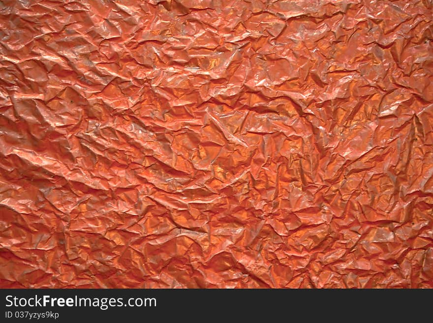 Red Wrinkled Foil Surface